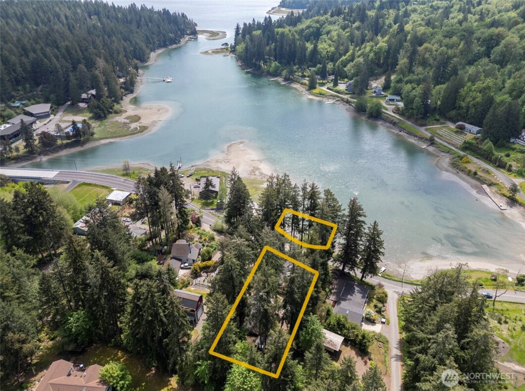 The user wants an alt text description for the provided image.
1.  **Identify the subject:** It's an aerial map or photo o...